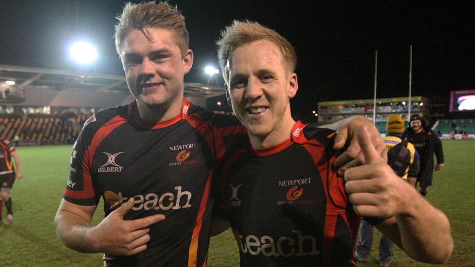 Dragons players celebrate beating Cardiff Blues