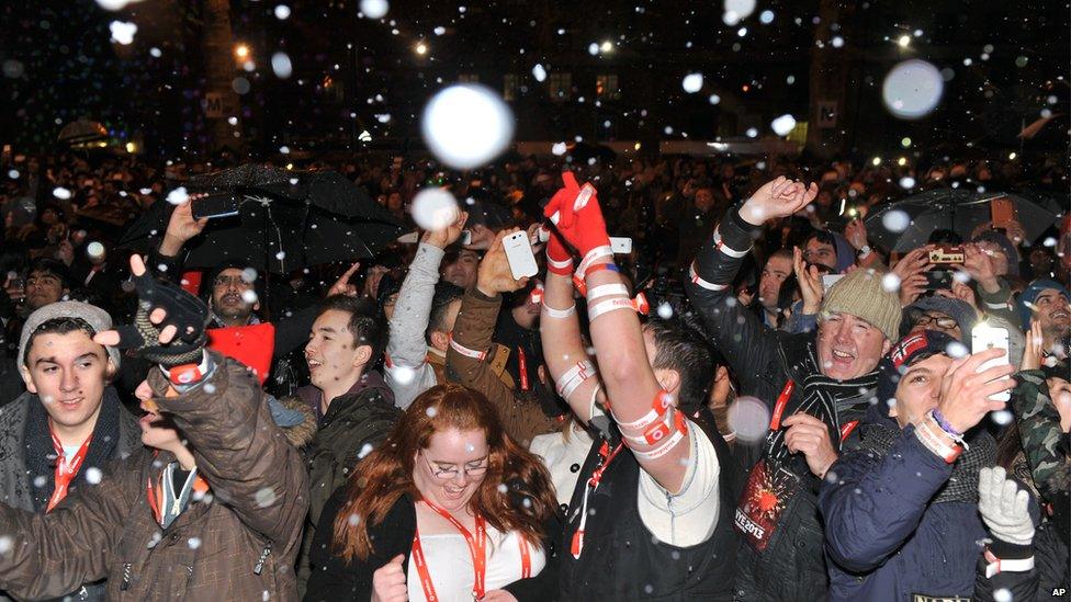 Flavoured snow falls on crowds at London's new year firework display