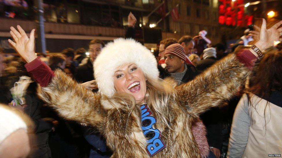 Woman celebrates the start of the new year at Edinburgh's street party celebrations