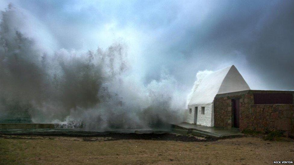 Waves crashing into the Le Don Hilton building – known locally as the “White House” - in St Ouen on the west coast of Jersey