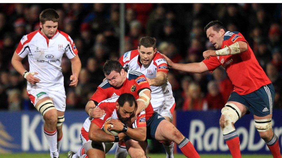 Kiwi prop John Afoa attempts to make ground for Ulster despite the attention of Damien Varley