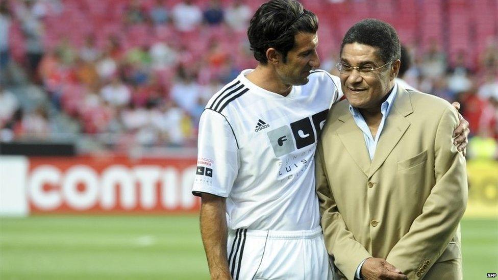 Luis Figo poses with Eusebio at the beginning of a Luis Figo Foundation charity football match at the Luz Stadium in Lisbon, 2012