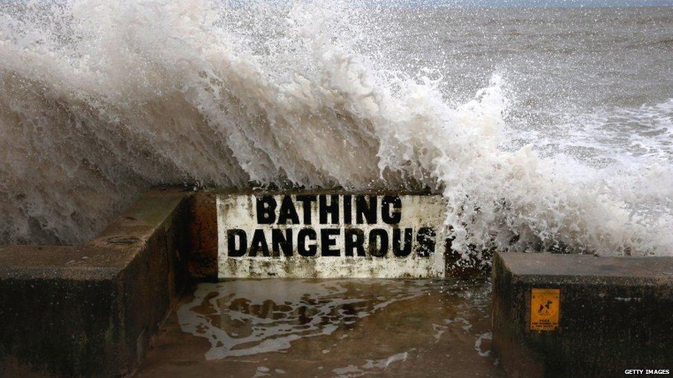 A sign warning "bathing dangerous"