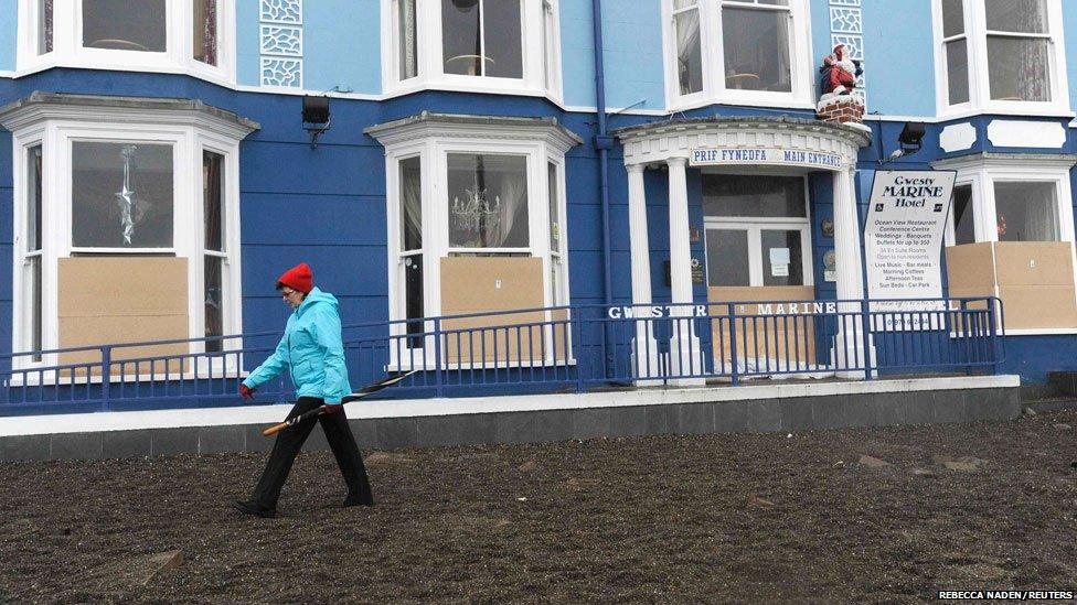 Sand and shale cover the promenade at Aberystwyth