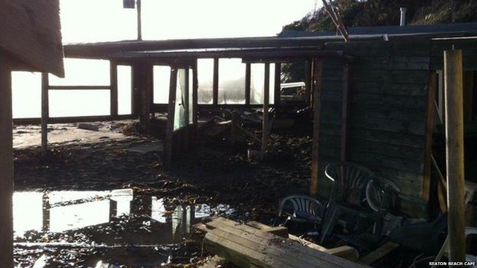 Seaton Beach Cafe, Cornwall, which has been damaged by rough seas