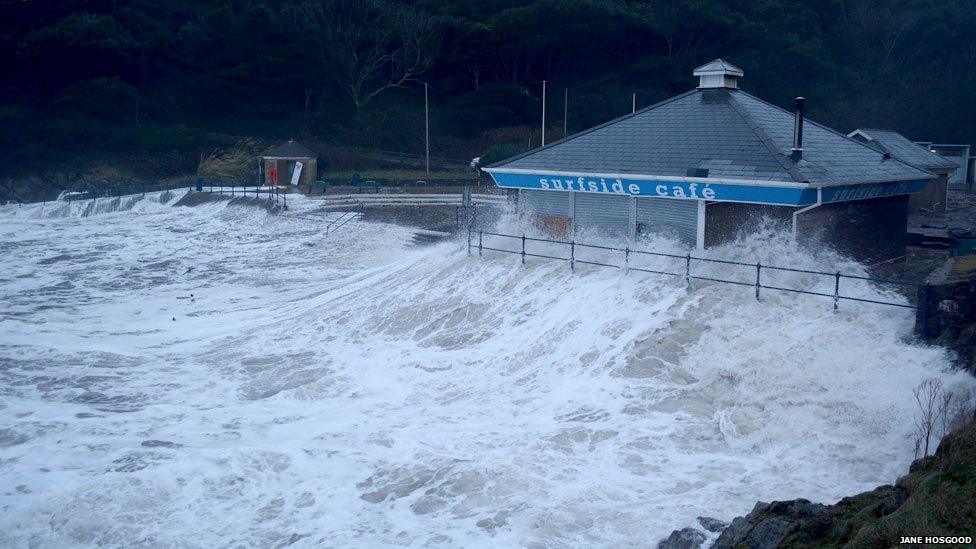 Surfside Cafe at Caswell Bay is pounded by waves