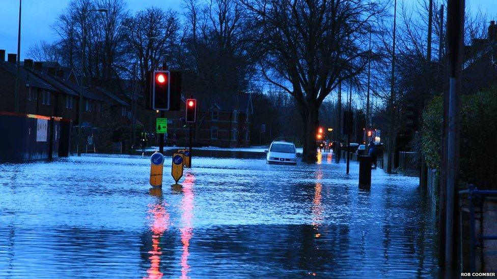 Taxi caught in floods