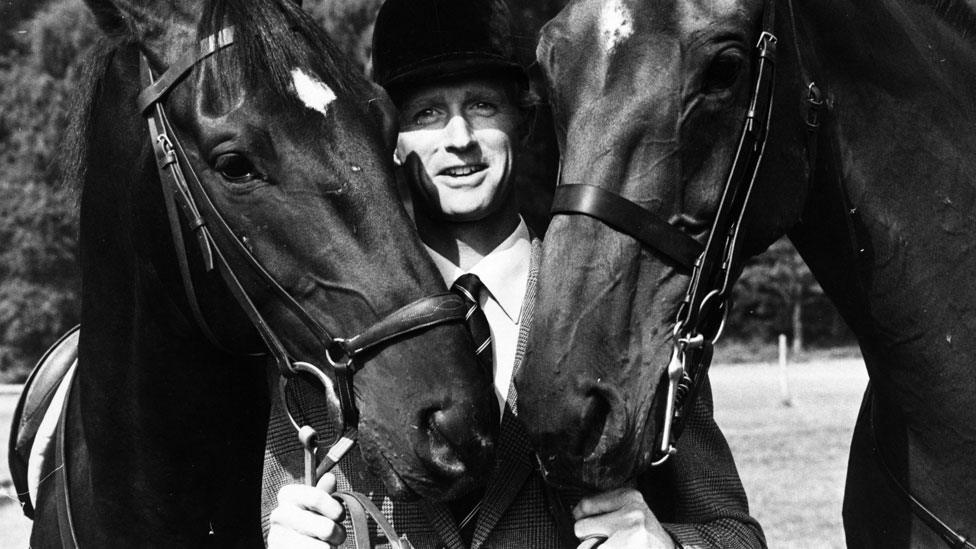 Richard Meade with two horses