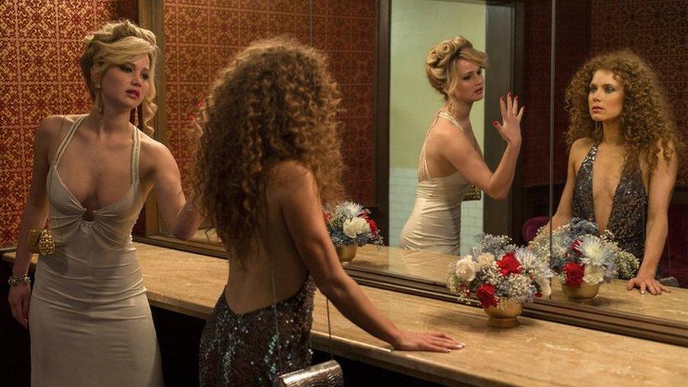 Jennifer Lawrence (left) and Amy Adams in American Hustle