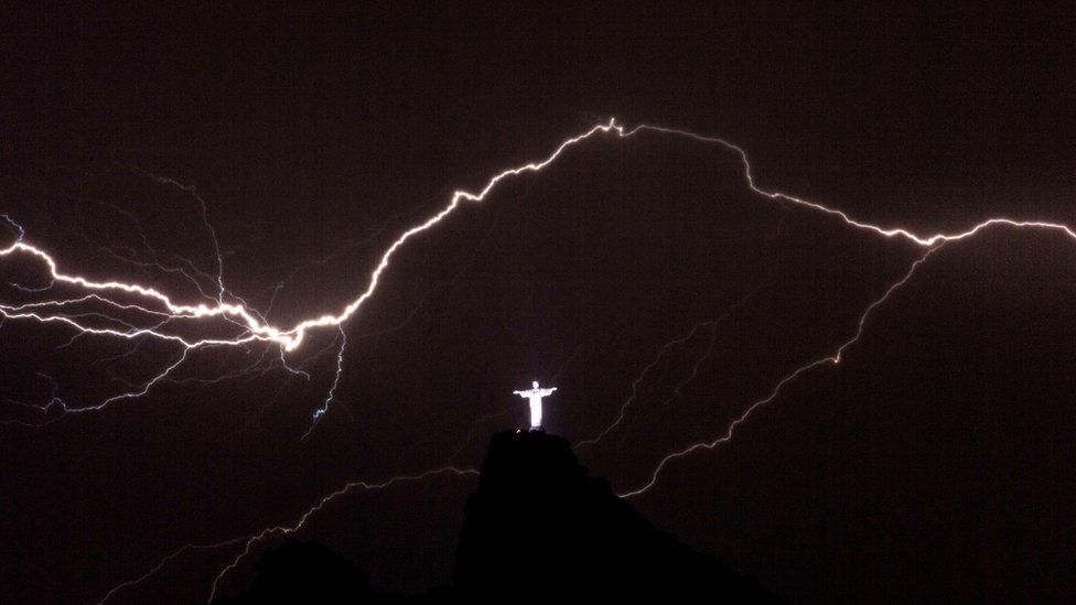The statue of Christ the Redeemer in a lightning storm