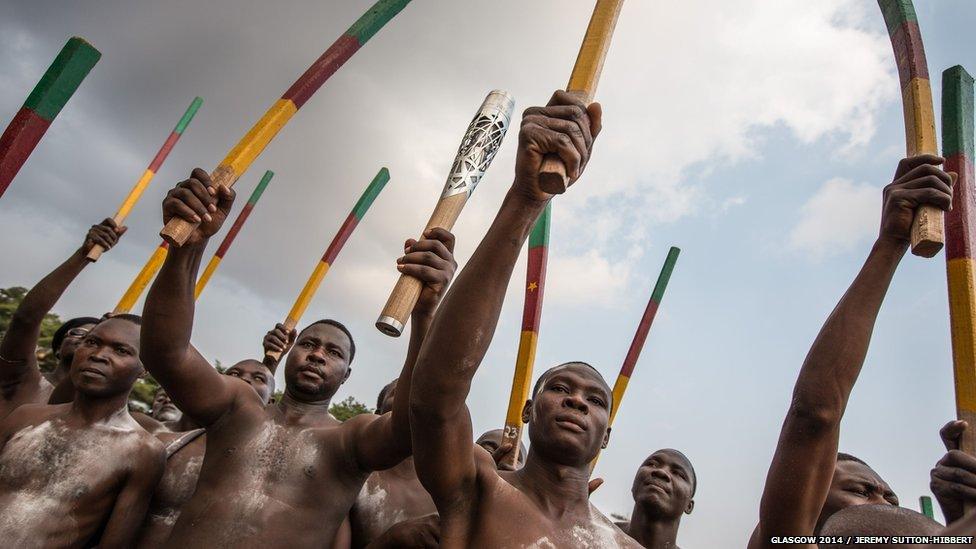 The Queen's baton is greeted with a display of traditional culture, music and dancing in Yaounde, Cameroon.