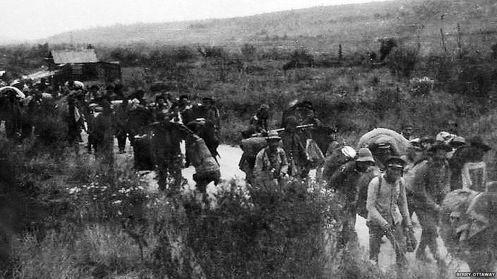 Row of homeless people