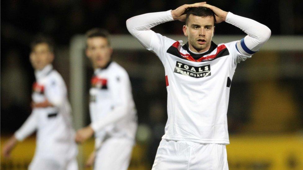 Crusaders captain Colin Coates reacts after a missed opportunity as the final ends scoreless after extra-time