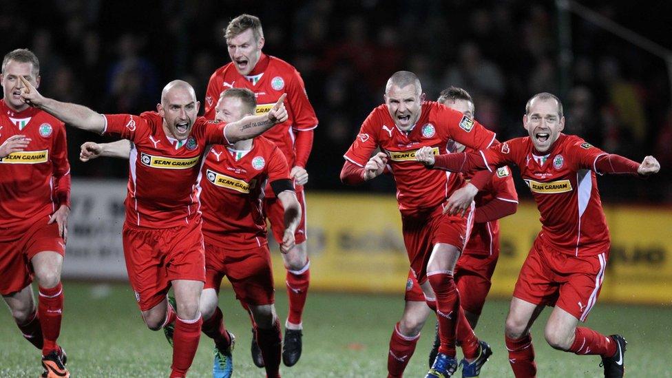 Celebrations start for Cliftonville after beating Crusaders 3-2 in a penalty shoot-out