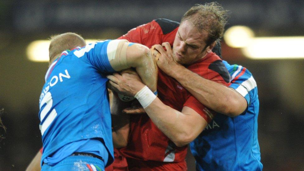 Wales lock Alun Wyn Jones is stopped by Italy