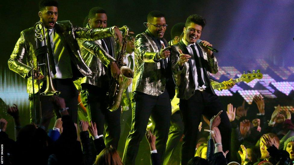 Bruno Mars (far right) kicks off the Super Bowl half-time show