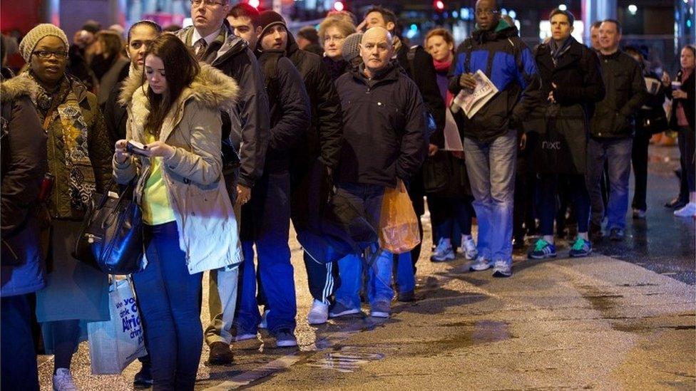 Queues of people outside Victoria Station