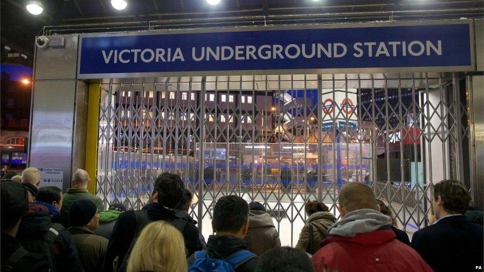 Queues of people outside Victoria Underground Station