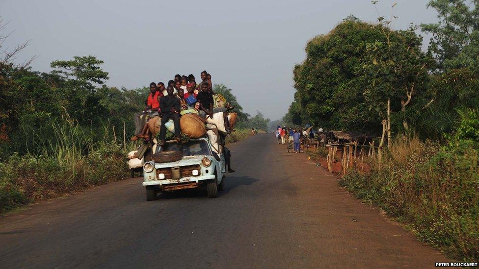 A vehicle loaded with people on a road in the Central African Republic - February 2014