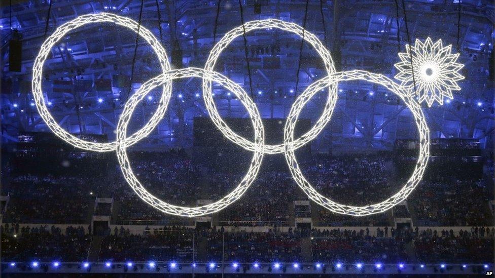 Four of the Olympic rings with the fifth ring not showing correctly