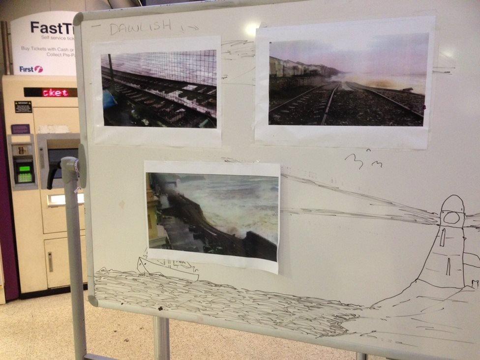 Pictures on an information board at Plymouth railway station