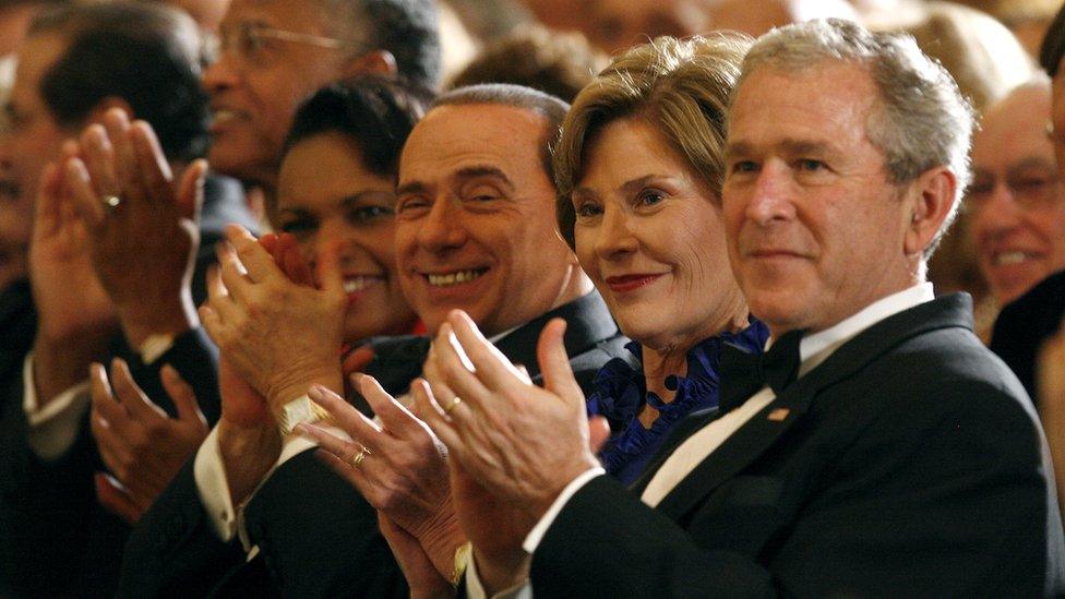 President George W Bush, First Lady Laura Bush and Italian Prime Minister Silvio Berlusconi watch a performance of the musical Jersey Boys