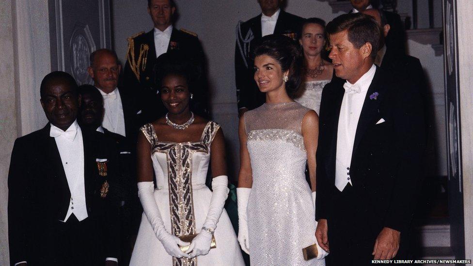 President John F Kennedy and Jacqueline Kennedy pose with President Felix Houphuet-Boigny of the Ivory Coast at the White House on 5 May 1962