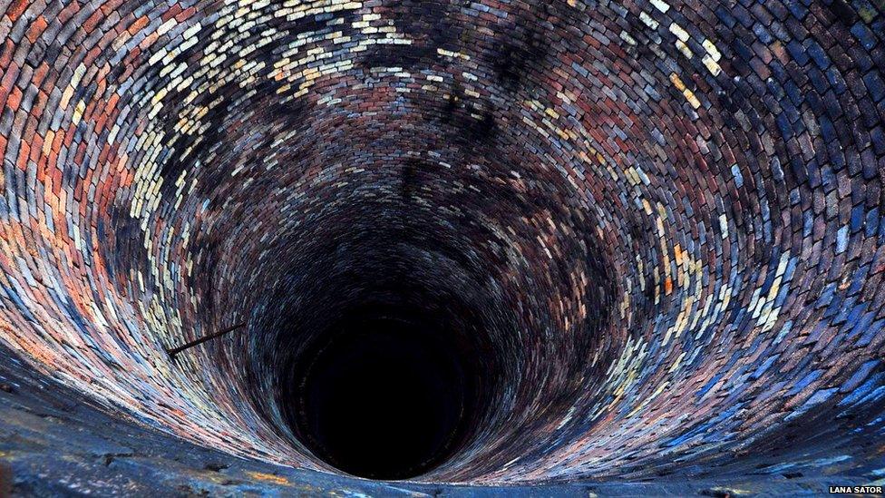 A tunnel with coloured bricks