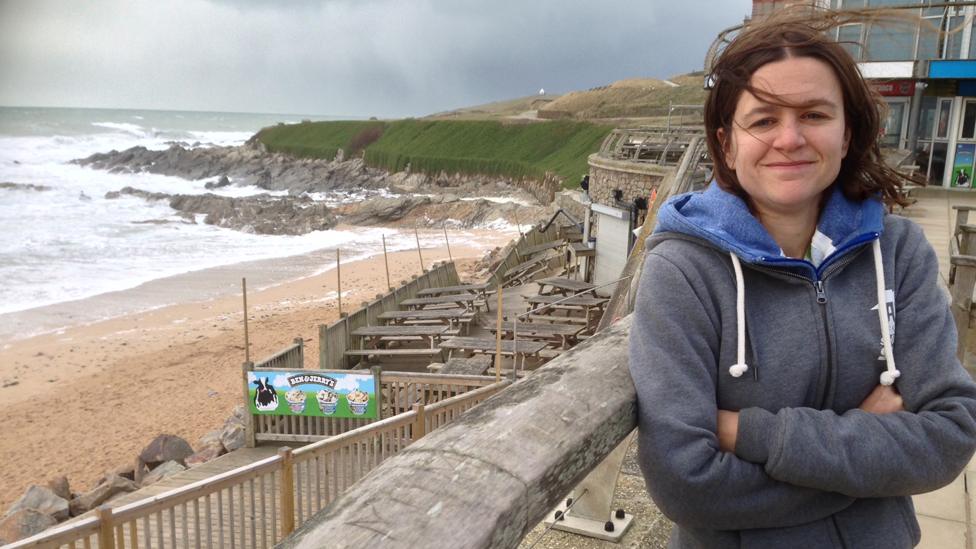 Hannah Turton outside Anne's Cottage Surf Shop, Fistral Beach, Newquay, 11 February 2014