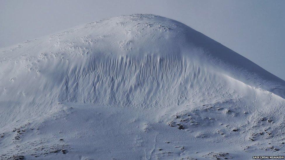 Sluffing on subsidiary summit of Sron a Ghoire