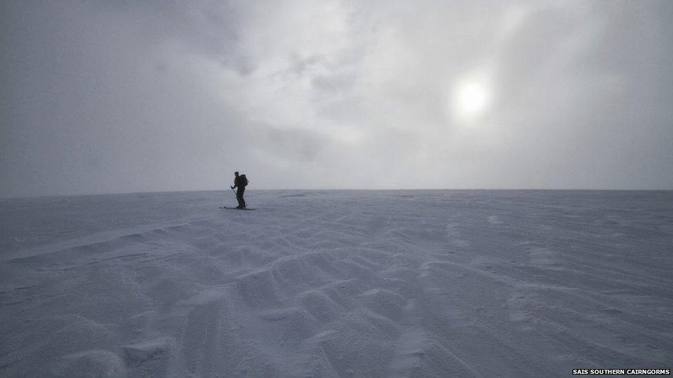 A skier crossing the Stuic in Southern Cairngorms