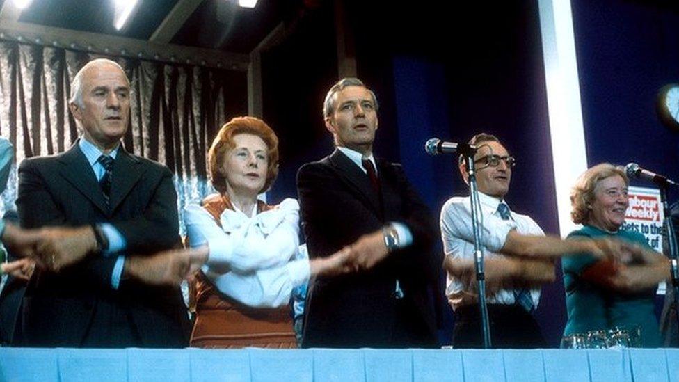 Benn, Tony standing next to Barbara Castle, as Labour MPs sing the Red Flag at the 1976 Labour Party Conference