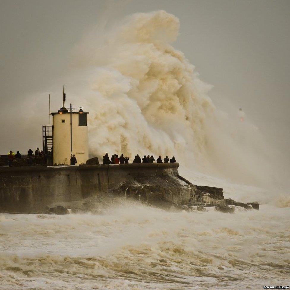 Waves break over Porthcawl harbour, South Wales