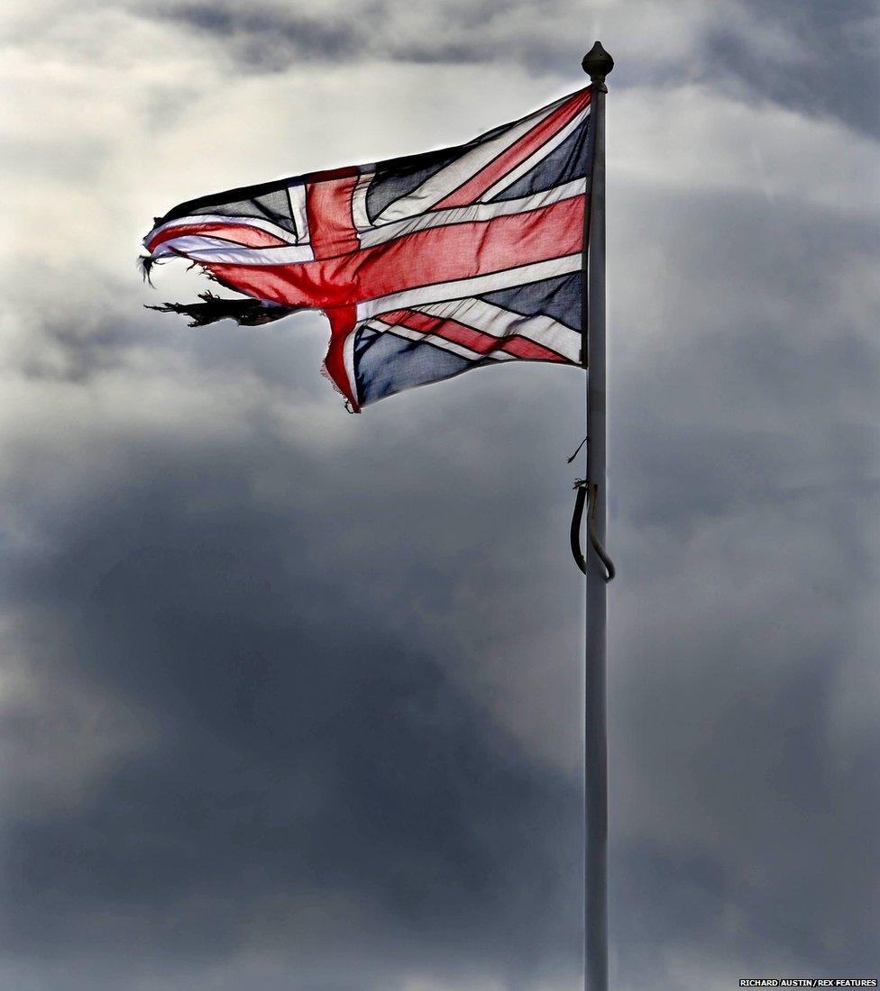 The Union flag flying above the harbour master's office on the Cobb at Lyme Regis