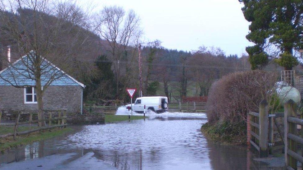 Combe Corner on the B4362 between Shobdon and Presteigne remains covered in floodwater