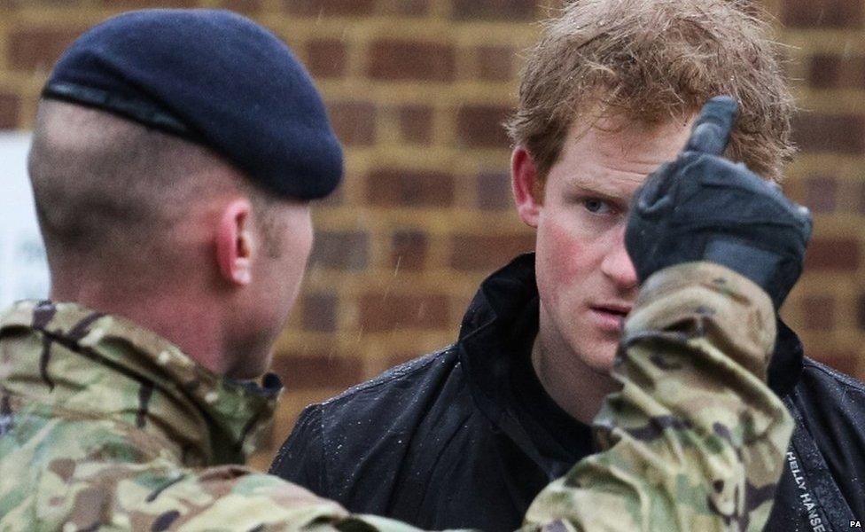 Prince Harry helps flood effort