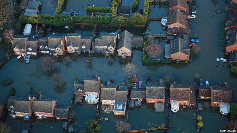 Houses in Staines-upon-Thames are inundated with flood water