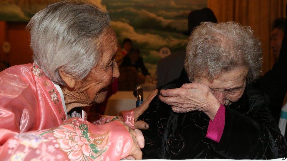 Lee Yong-sil (R) of South Korea embraces her sister Lee Jong-Sil (L) of North Korea during a reunion event for families divided by the two countries, at the North Korean resort area of Mount Kumgang on 20 February, 2014