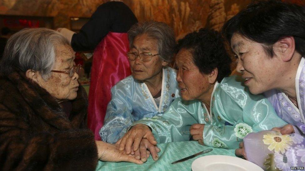 South Korean Kim Sung-yun (L), 96, talks with her North Korean sister Kim Seok-ryeo (2nd L), 80, and family members during their family reunion at the Mount Kumgang resort in North Korea on 20 February 2014