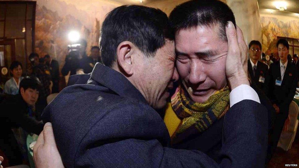 South Korean Park Yang-gon (R), 53, and his North Korean brother Park Yang-su, who was abducted by North Korea, cry during their family reunion at the Mount Kumgang resort in North Korea on 20 February 2014