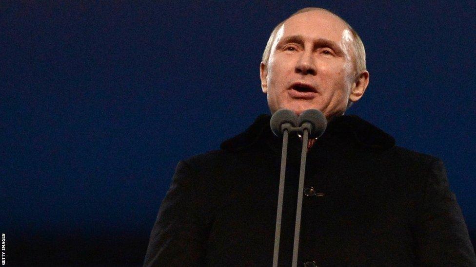 Russia's President Vladimir Putin declares the 2014 Sochi Winter Olympics open during the opening ceremony at the Fisht Olympic Stadium on February 7, 2014 in Sochi.