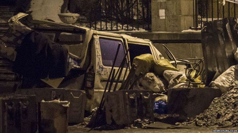 Wrecked car in Independence Square