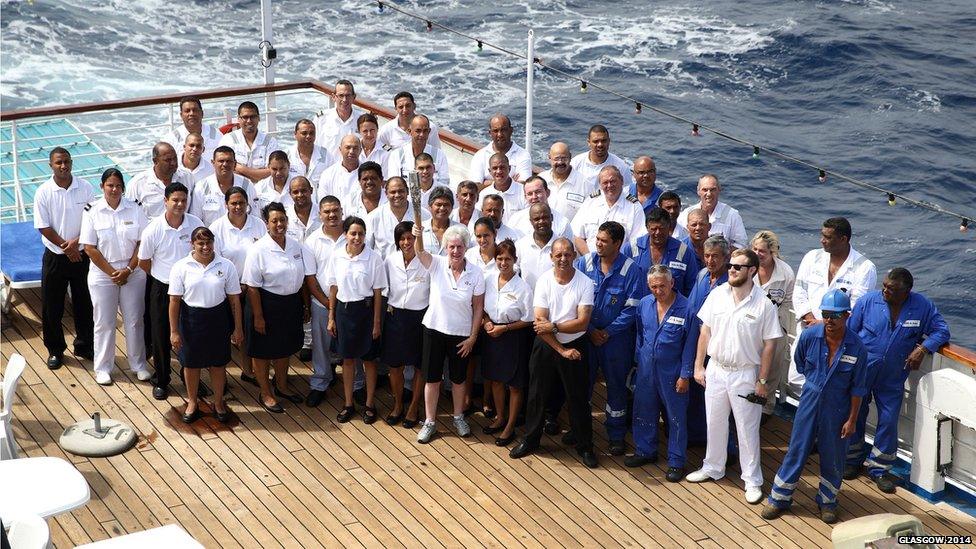 Commonwealth Games Federation Honorary Secretary General Louise Martin CBE holds the Queen's Baton with the RMS St. Helena