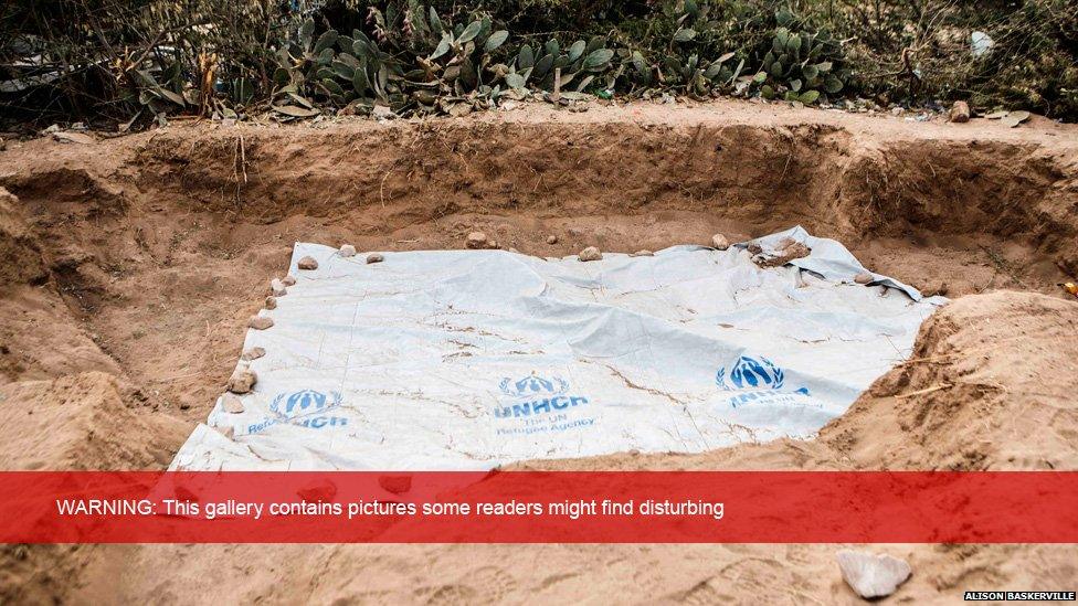 Human remains are revealed in a grave site in the Somaliland capital of Hargeisa