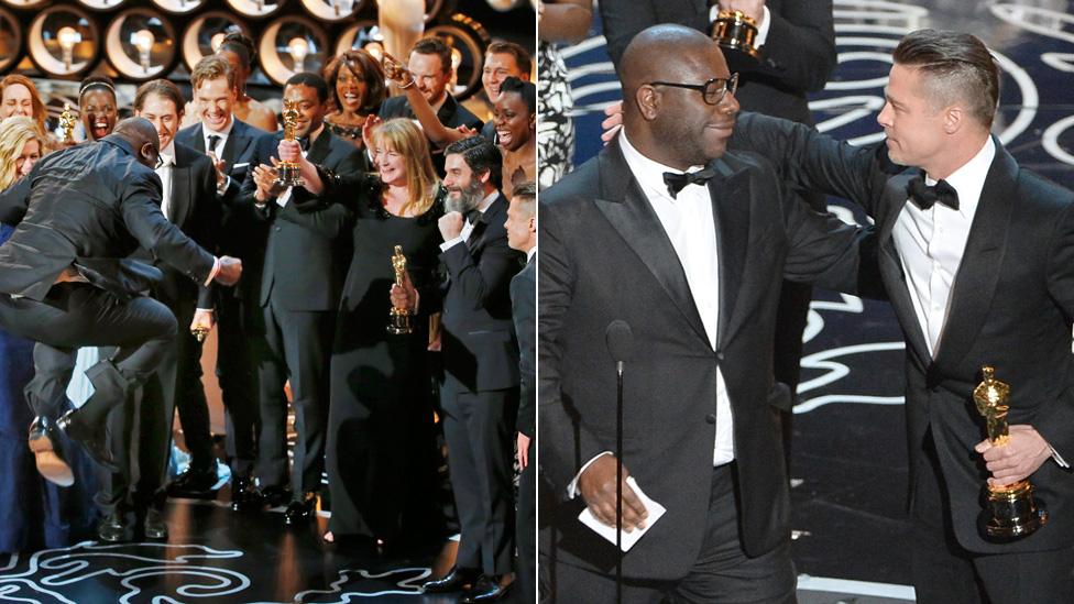 Steve McQueen accepts best picture and has a hug from Brad Pitt.