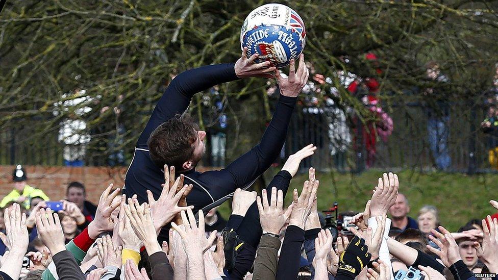 Shrovetide ball being caught