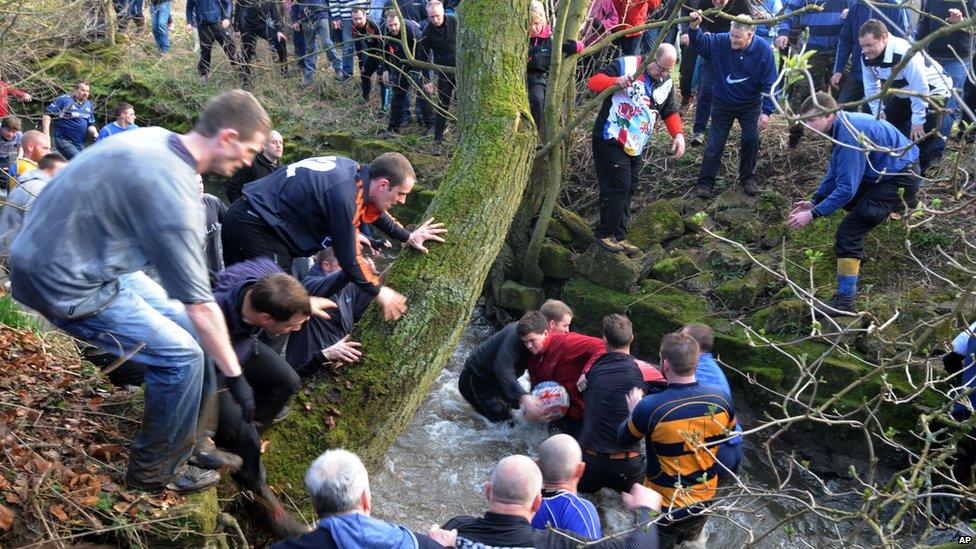 Up'ards and the Down'ards competing for the ball in the River Henmore