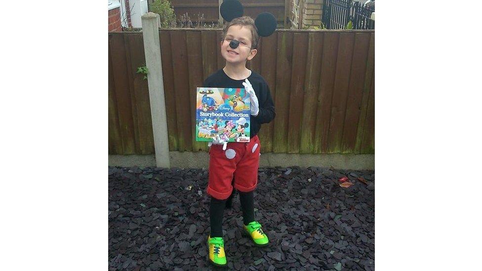 Oliver dressed as Mickey Mouse