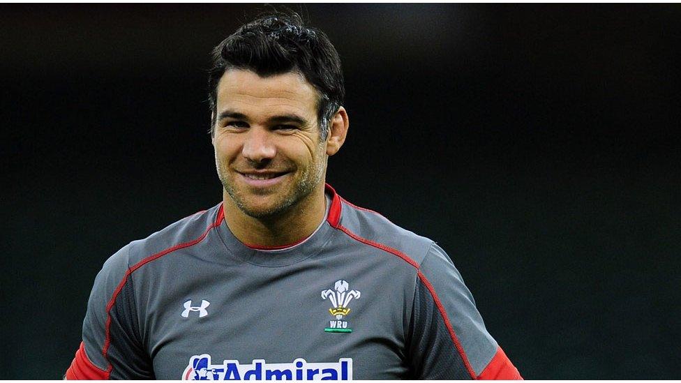 Mike Phillips smiles during a Wales training session