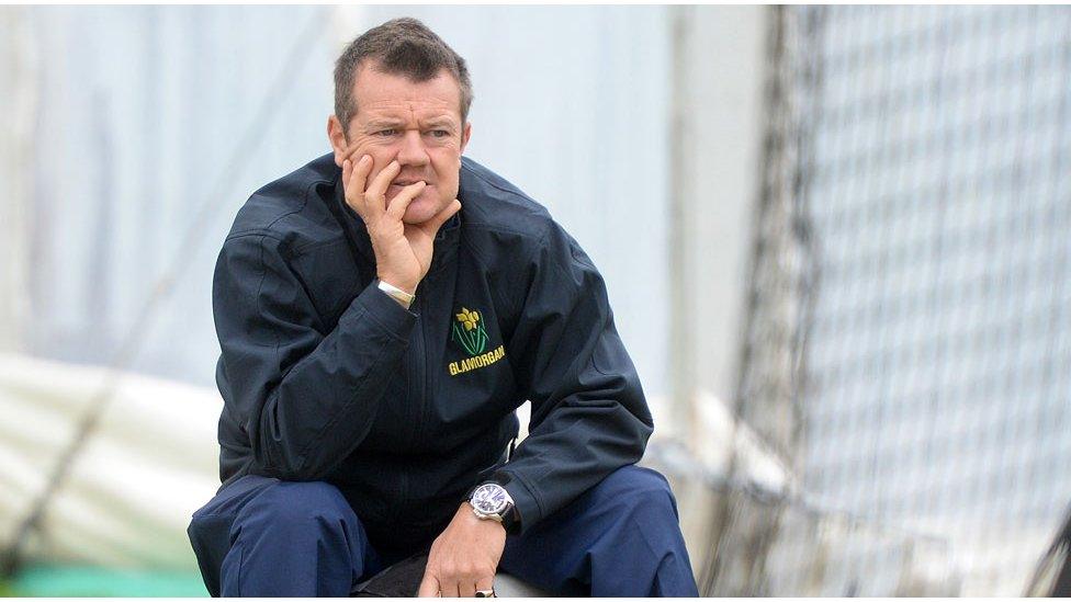 Toby Radford sitting on a bag in the nets at Glamorgan Cricket Club